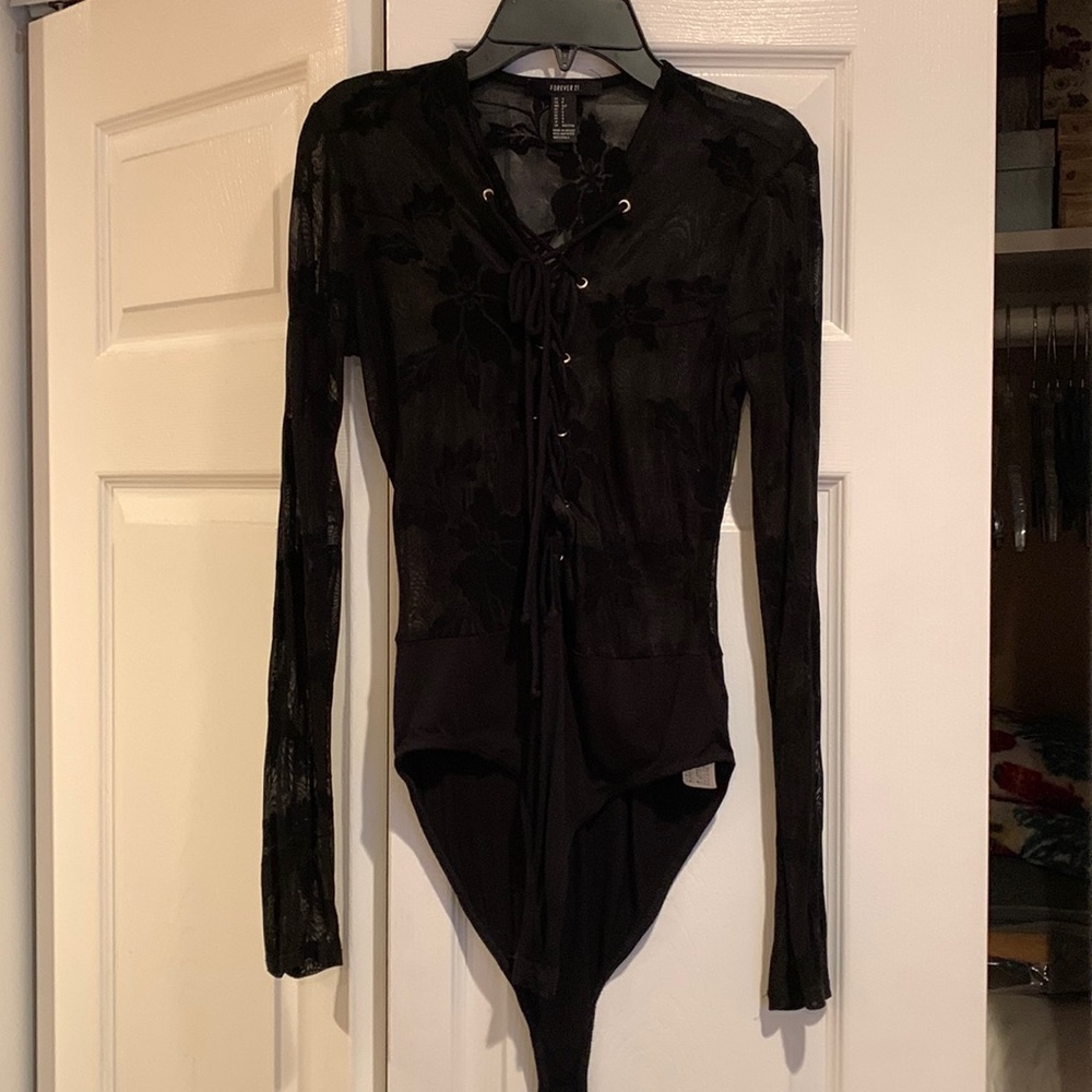 Black lace and solid body suit